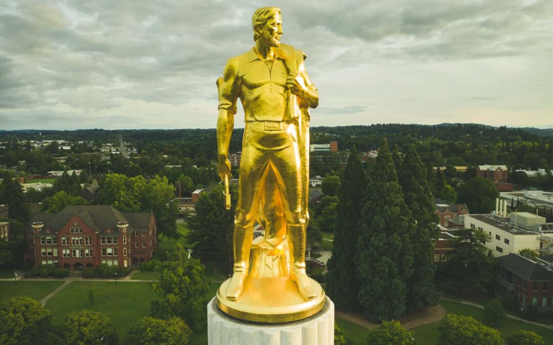 The gold pioneer statue that sits on top of the Oregon capitol dome where the senate recently passed SB 292A