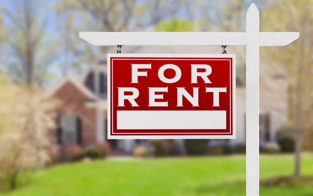 A for rent sign sits on a lawn as a result of tenant turnover.