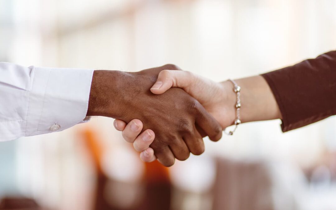 an image showing two hand shaking demonstrating a positive relationship between the two parties.